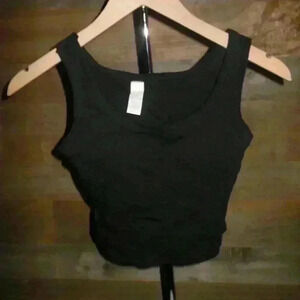 Black crop top w/ slits on sides has padding inside  - OS